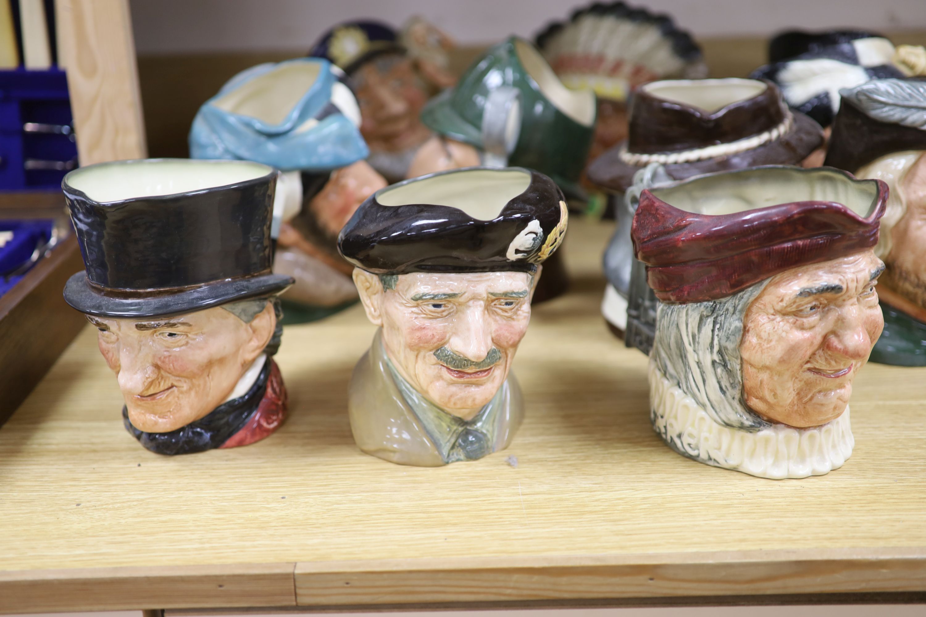 Eleven Doulton character jugs